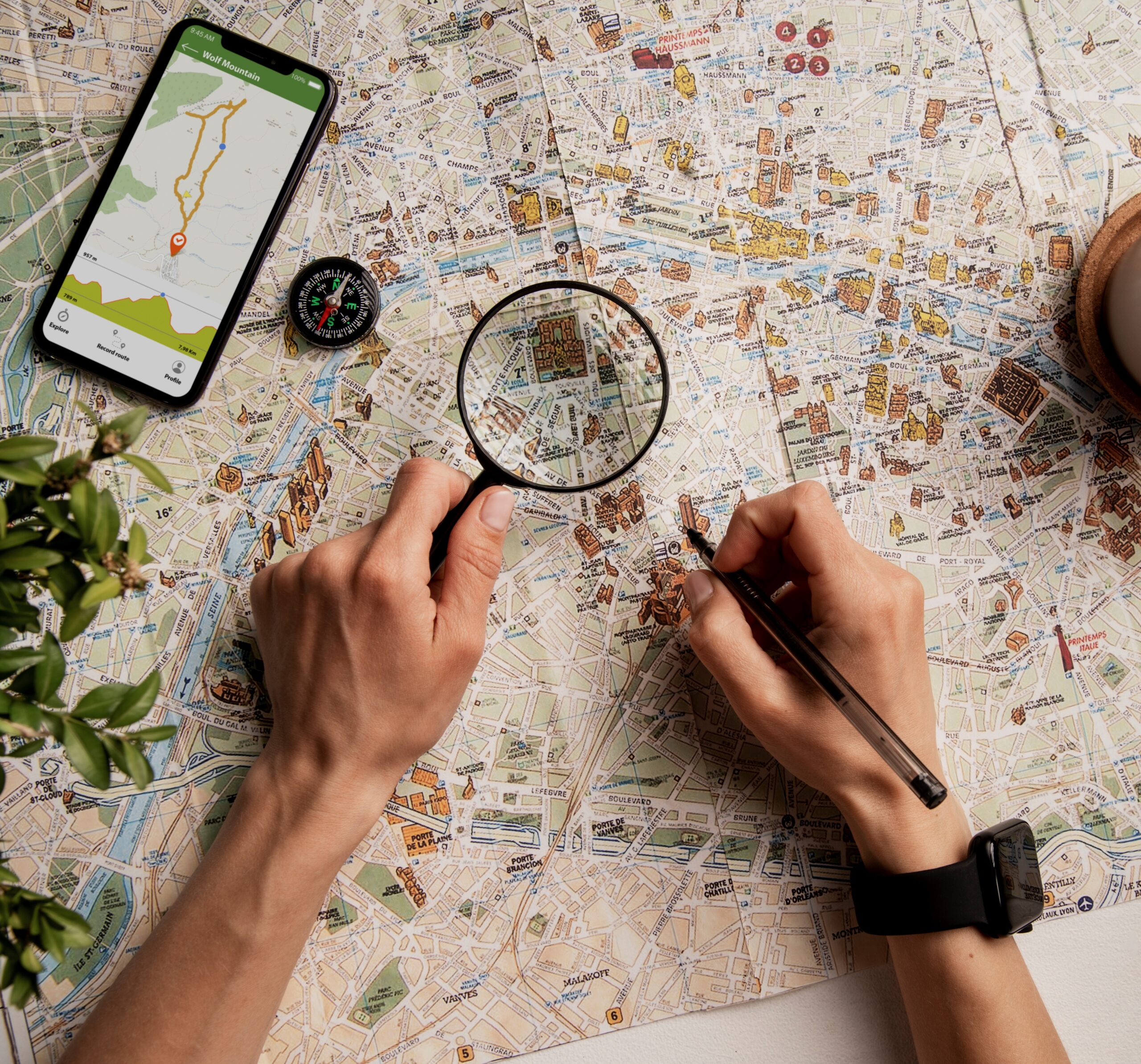 view-person-using-world-travel-map-with-magnifying-glass Extreme Sports Mountain Climbing